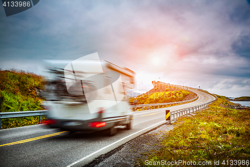 Image of Norway. Caravan car travels on the highway.