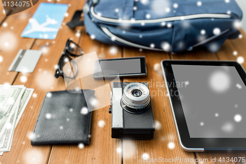 Image of close up of camera, gadgets and travel stuff