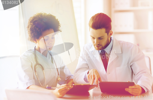 Image of two doctors meeting at hospital office