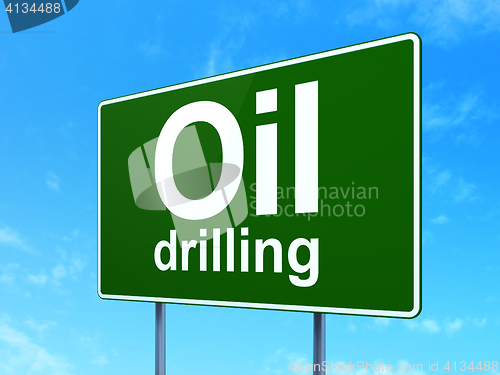 Image of Manufacuring concept: Oil Drilling on road sign background