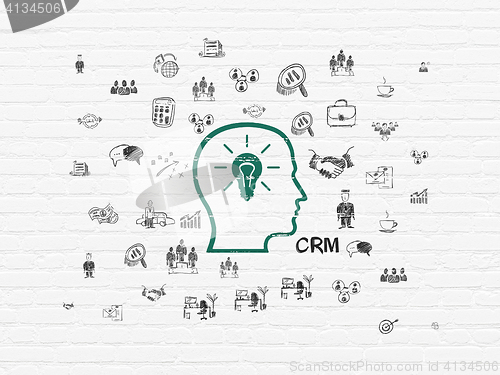 Image of Business concept: Head With Lightbulb on wall background