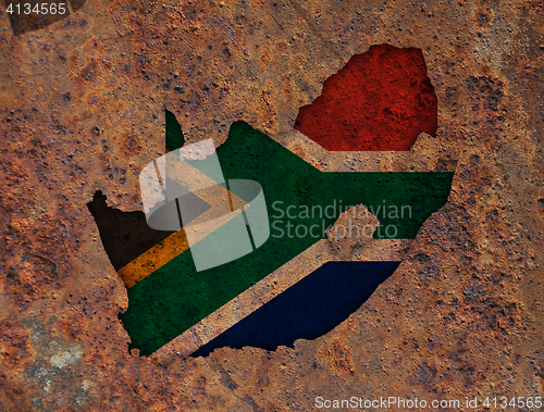 Image of Map and flag of South Africa on rusty metal