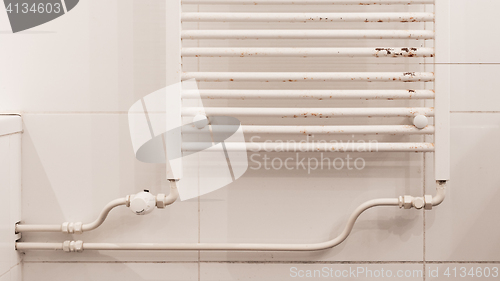 Image of Rusty household cast iron radiator