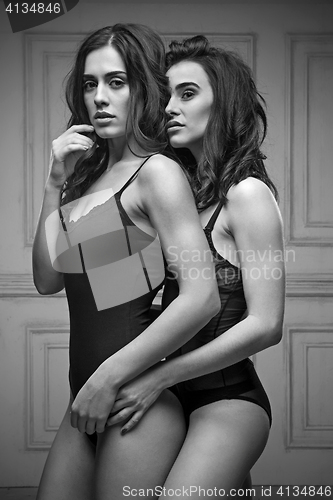 Image of Two beautiful women in black erotic lingerie