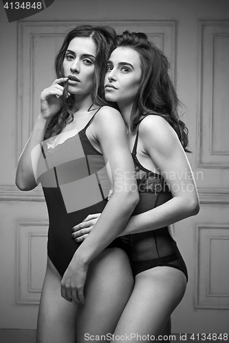 Image of Two beautiful women in black erotic lingerie
