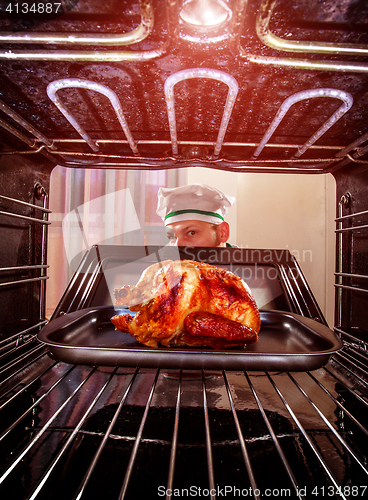 Image of Cooking chicken in the oven.