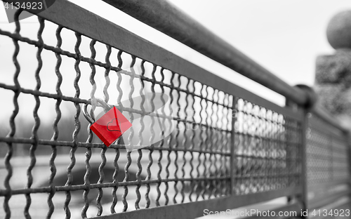Image of Love lock on bridge as symbol of infinite true love