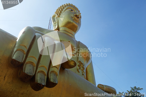 Image of Golden Buddha statue of Big Buddha over blue sky