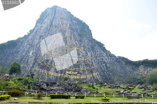 Image of Buddha carved on cliff mighty laser