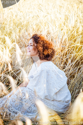 Image of beautiful smiling woman outdoors