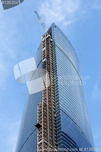 Image of Modern buildings of glass and steel skyscrapers against the sky