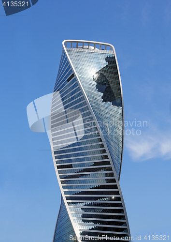 Image of Modern buildings of glass and steel skyscrapers against the sky