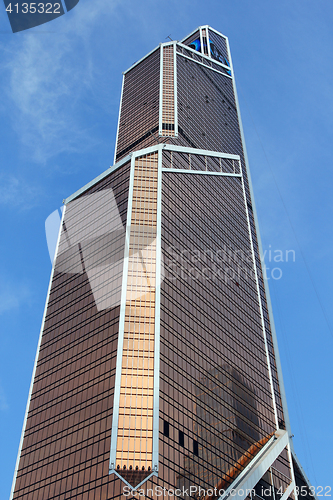 Image of Modern buildings of glass and steel skyscrapers against the sky