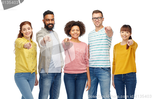 Image of international group of people pointing on you