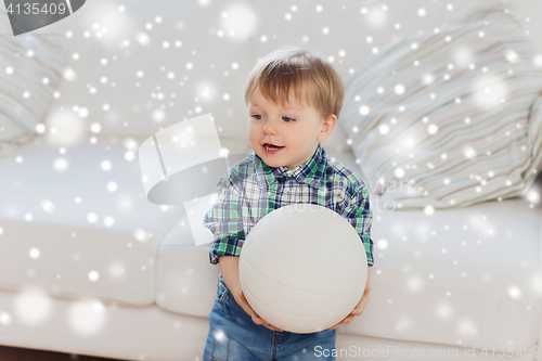 Image of happy little baby boy with ball at home