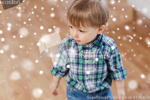 Image of happy little baby boy at home