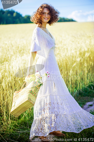 Image of beautiful woman in white summer dress