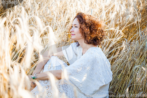 Image of middle aged pretty smiling woman