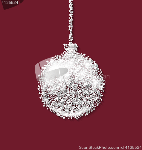 Image of Christmas ball on red backdrop made from white hoarfrost particl