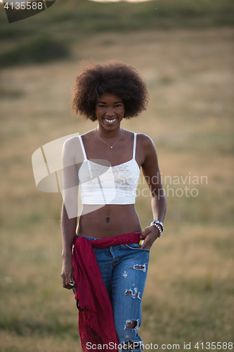 Image of young black woman in nature