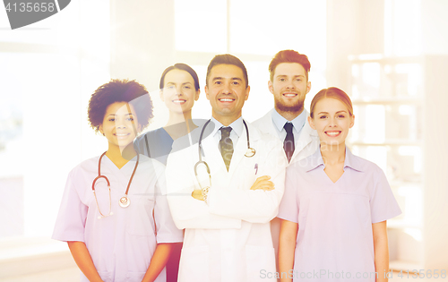 Image of group of happy doctors at hospital