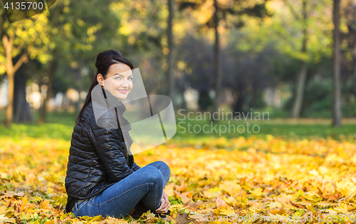 Image of Woman in a Forest in the Autumn