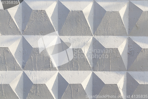 Image of stone wall painted white