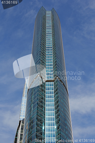 Image of Modern buildings of glass and steel skyscrapers against the sky