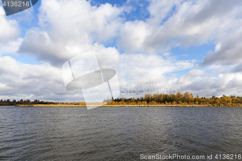 Image of the river and the forest, autumn