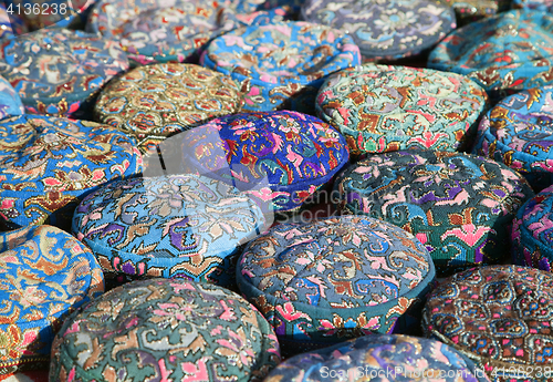 Image of The traditional Uzbek cap, named tubeteika, on a market