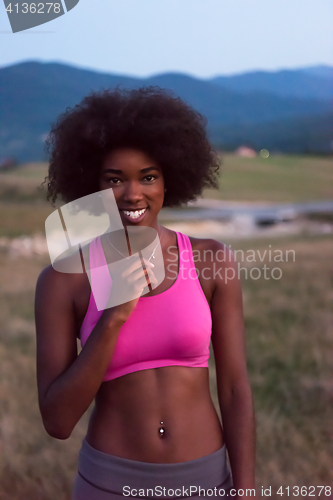 Image of young black woman in nature