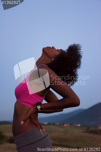 Image of young black woman in nature