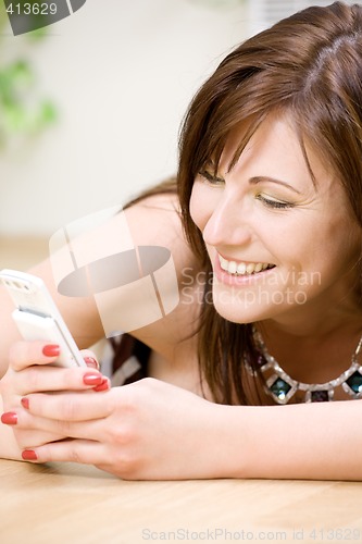 Image of woman with white phone