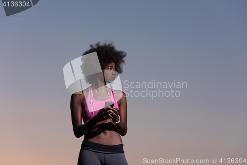 Image of young african american woman in nature