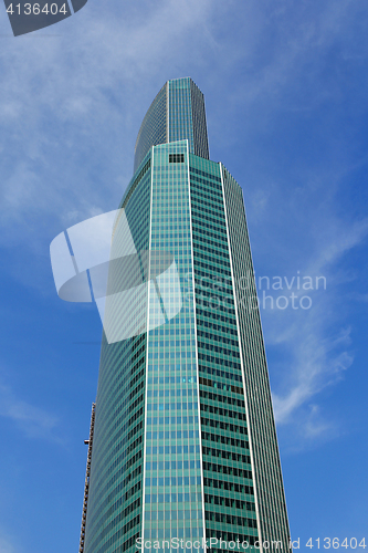 Image of Modern buildings of glass and steel skyscrapers against the sky