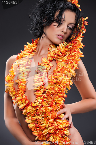 Image of Woman And Rose Petals