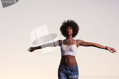 Image of young black woman in nature