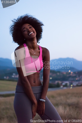 Image of young black woman in nature