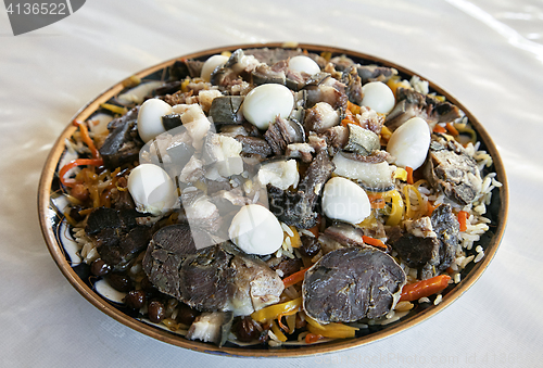 Image of Uzbek national dish pilaf on a plate