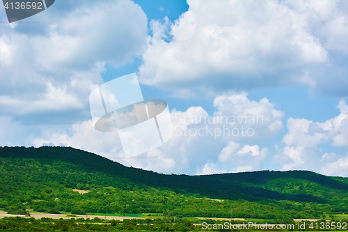 Image of Hills under the Cloudy Sky