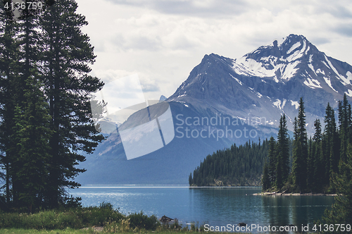 Image of Beautiful lake landscape with mountain peaks