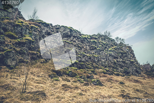 Image of Black cliffs with green moss