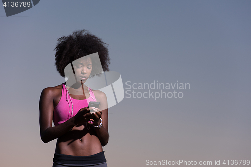 Image of young african american woman in nature