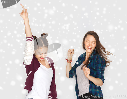 Image of happy smiling pretty teenage girls dancing