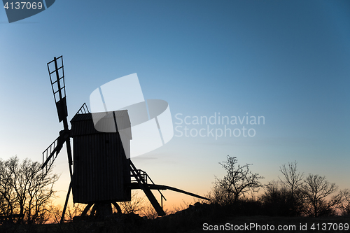 Image of Old wooden windmill silhouette