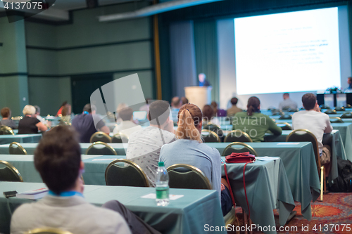 Image of Audience in lecture hall on scientific conference.