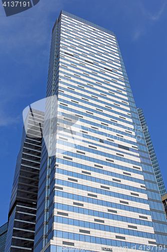 Image of Modern buildings of glass and steel skyscrapers against the sky