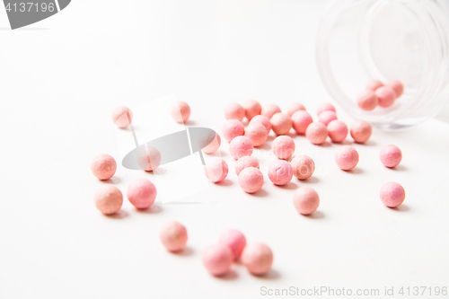 Image of Powder balls isolated on white