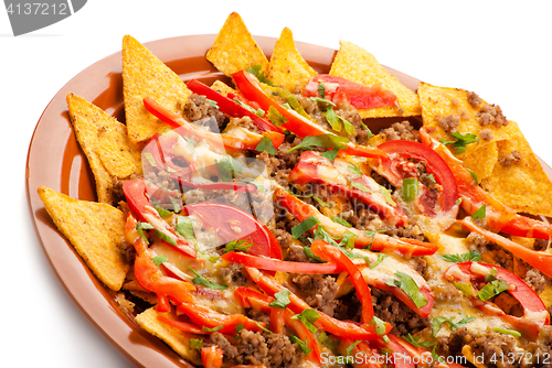 Image of spicy nachos with pork, tomato and pepper