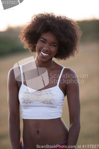 Image of young black woman in nature